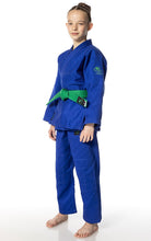 Load image into Gallery viewer, Child wearing a blue Judo gi with a green belt on a white background