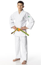 Load image into Gallery viewer, Child wearing a white Judo gi with a colorful belt on a white background
